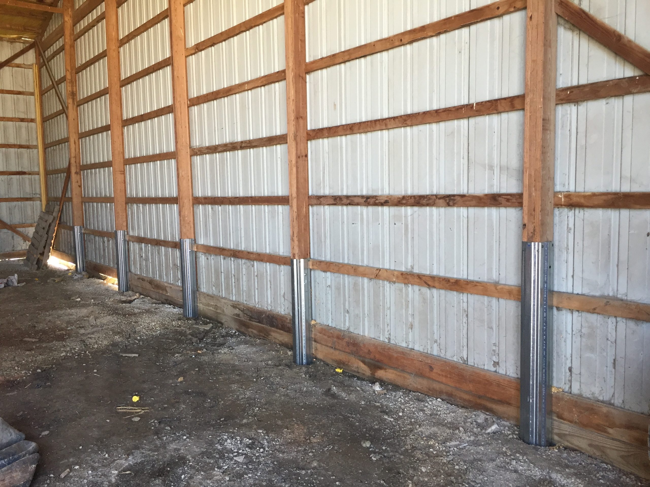 A post-frame barn with Repair Sleeves, part of Wood Column Repair in Springfield IL