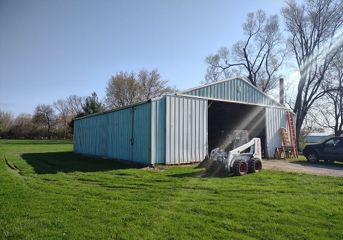 A structure being built using Post-Frame Construction in Illinois