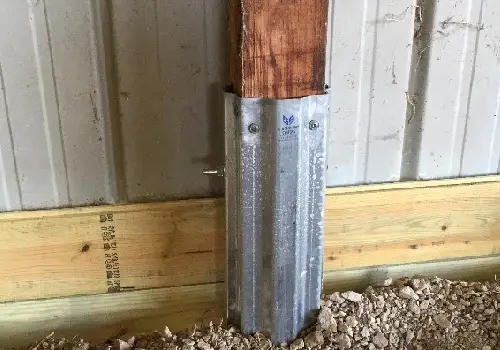 A rotted wood column that was repaired with a Column Repair Sleeve from Anthem Built