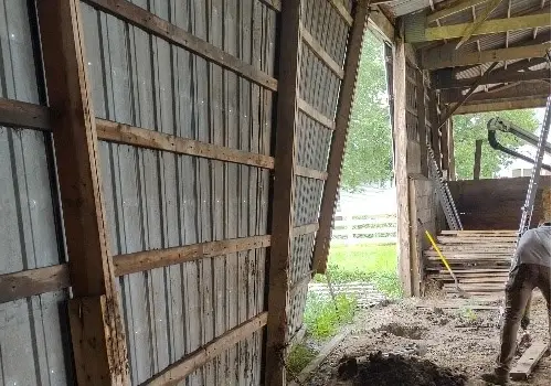 The interior of a deteriorating structure, requiring Pole Barn Repair in Champaign IL